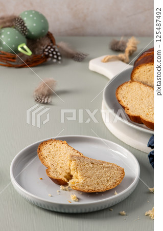 Sweet Easter bread slices on a plate 125487492