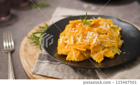 Farfalle pasta with pumpkin sauce Farfalle pasta with pumpkin sauce 125487501