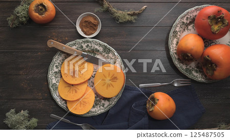 Orange persimmons 125487505