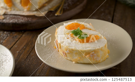 Meringue roll cake Meringue roll cake 125487513
