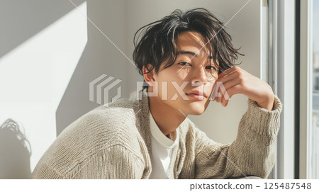 A handsome young man looking at this AI A handsome young man looking at this AI 125487548