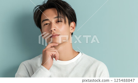 A handsome young man looking at this AI 125488847