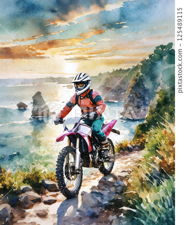 A motorcyclist rides along a coastal trail 125489115