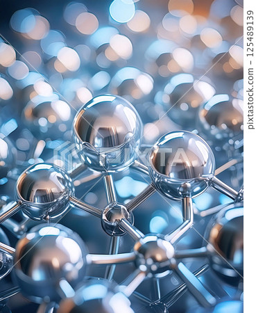 Metallic orbs connected in a lattice structure, reflecting light 125489139