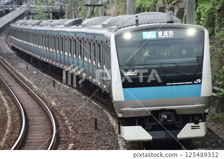 JR East Keihin Tohoku Line E233 series 1000 series train heading for Minami-Urawa JR East Keihin Tohoku Line E233 series 1000 series train heading for Minami-Urawa 125489312
