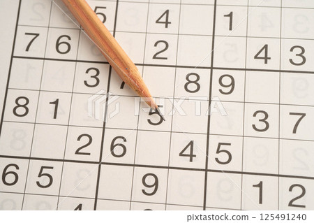 Sudoku puzzle, game to play for keep you brain younger for developing Alzheimer disease in senior patient. 125491240