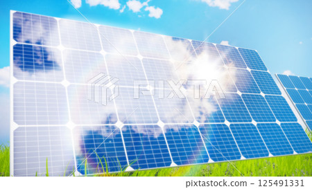 Solar panels reflecting sunlight and the sky 125491331