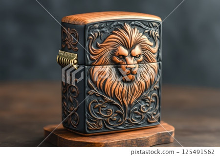 Intricately carved lighter featuring a lion design surrounded by ornate floral patterns, showcasing craftsmanship and artistry in a unique piece of functional art 125491562