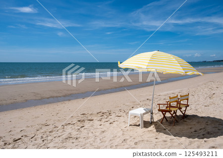 Relaxing Chairs and Umbrella on Cha-am Beach 125493211