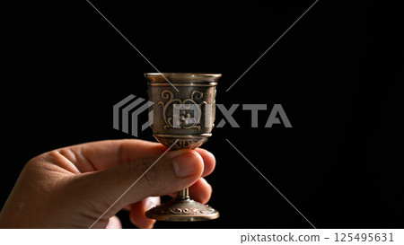 Sacred ceremony of Communion, Christians express their faith by partaking in holy bread, deepening their spiritual connection with God within the church. communion, religion, christian, faith, holy. Sacred ceremony of Communion, Christians express their faith by partaking in holy bread, deepening their spiritual connection with God within the church. communion, religion, christian, faith, holy. 125495631