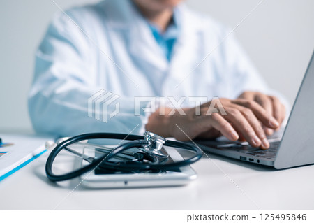 Doctor, equipped with a stethoscope, provided medical care to the patient at clinic, ensuring their health and well-being as a dedicated physician in the health care system. doctor, medical, health. 125495846