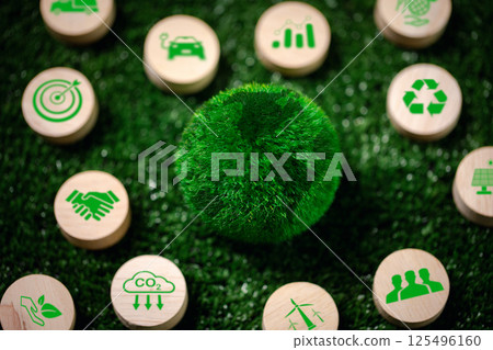 Wooden cube with eco-friendly green icon symbolizes sustainable business practices that prioritize environmental protection and health of the earth's ecology. eco, green, earth, icon, wooden, cube. Wooden cube with eco-friendly green icon symbolizes sustainable business practices that prioritize environmental protection and health of the earth's ecology. eco, green, earth, icon, wooden, cube. 125496160