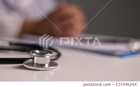 Doctor prays for the health of the person under their care, as medicine, nurses, and health care at the hospital work together to fight the disease. doctor, pray, health, person, medicine, care. Doctor prays for the health of the person under their care, as medicine, nurses, and health care at the hospital work together to fight the disease. doctor, pray, health, person, medicine, care. 125496264