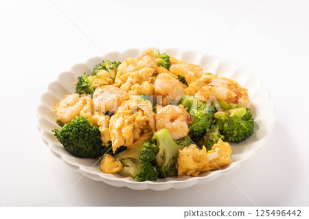Broccoli fried eggs 125496442