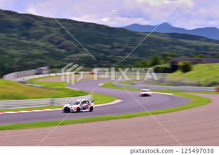 Sports car on the circuit Sports car on the circuit 125497038