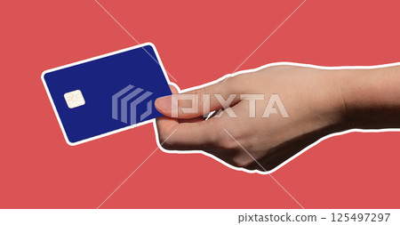Card in female hand closeup. Plastic bankcard with chip showing in studio, modern design for 125497297