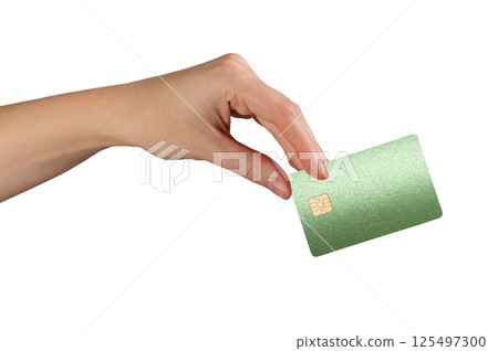 Card in female hand. Green plastic bankcard held front side, used for payment, shopping, finance, 125497300