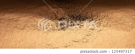 Copper foil background with a polished, golden texture. Shimmering, grunge effect with a rich, sleek 125497317