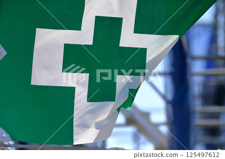 Safety and health flags at construction sites Safety and health flags at construction sites 125497612