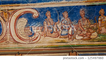 Frescoes Decoration On Wall Of Hanuman Temple In Jaipur, India. Religious Motifs From Life Of Hanuman Are Painted. Monkey-like Deity, Son Of Wind God Vayu. Scene With Indian Nobles With Swords And Bow 125497860