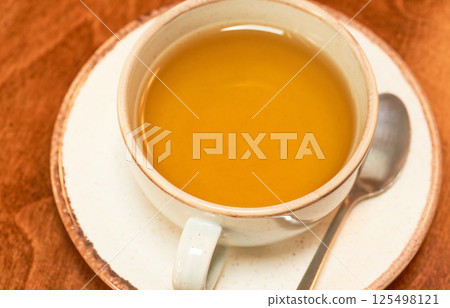 Cup of tea on the table, closeup. Top view 125498121