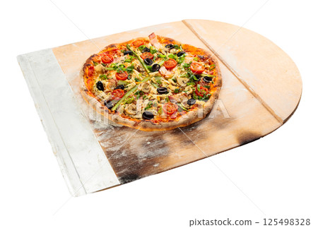 Wooden pizza paddle with Italian pizza isolated on a white background. 125498328
