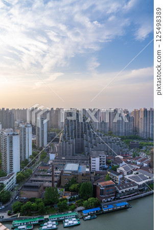 Aerial view of the city along Suzhou River Aerial view of the city along Suzhou River 125498389