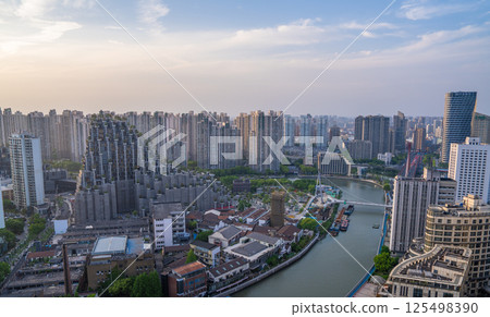Aerial view of the city along Suzhou River Aerial view of the city along Suzhou River 125498390