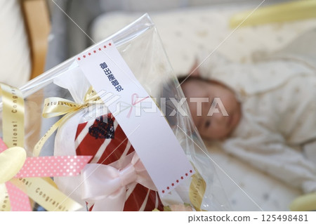 Diaper cake for baby shower Diaper cake for baby shower 125498481