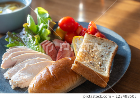Colorful bread and chicken morning plate 125498505