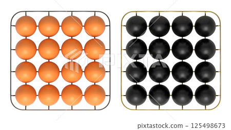 Metal trays filled with neatly stacked gold and black eggs, isolated on white transparent background. 125498673