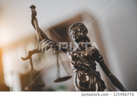Lady justice,Law theme, mallet of the judge, law enforcement officers, evidence-based cases and documents taken into account. Lady justice,Law theme, mallet of the judge, law enforcement officers, evidence-based cases and documents taken into account. 125498778