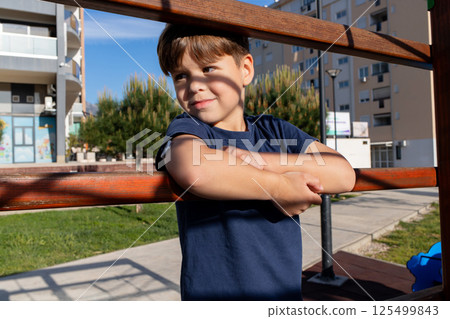 Boy with diabetes on playground Boy with diabetes on playground 125499843