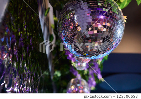 Experience the Stunning Disco Ball Reflections at an Exciting Nightclub Event Tonight 125500658
