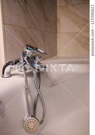 Explore trends in Modern Bathroom Faucet and Tub Design, focusing on elegance and style 125500821