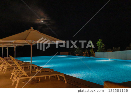 Iraph SUI Luxury Collection Resort Hotel in the tropical island of Miyakojima: The illuminated pool at night Iraph SUI Luxury Collection Resort Hotel in the tropical island of Miyakojima: The illuminated pool at night 125501136