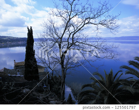 View of Lake Bracciano from a hill in the old town of Anguillara, Italy 125501797