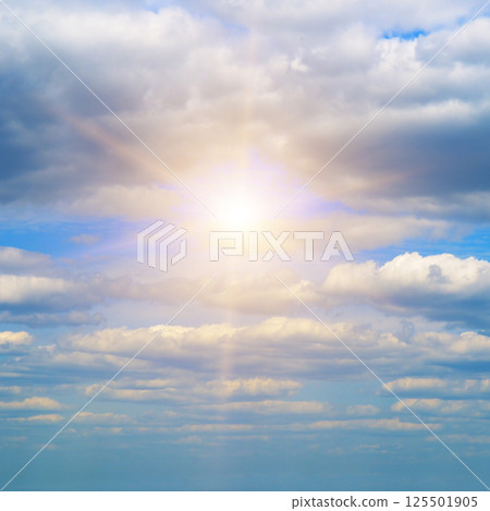 Blue sky with clouds and bright sun. 125501905
