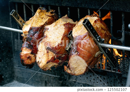 Juicy Meat Roasting on Barbecue Grill Juicy Meat Roasting on Barbecue Grill 125502107