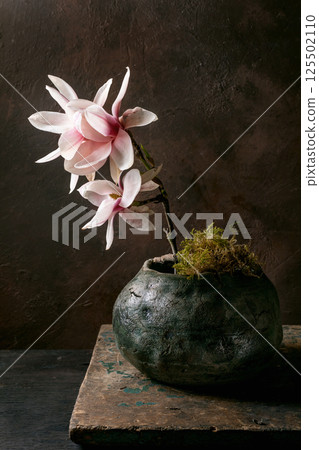 Elegant Magnolia Flowers in Ceramic Pot 125502110