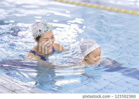 Baby Swimming Baby Swimming 125502360