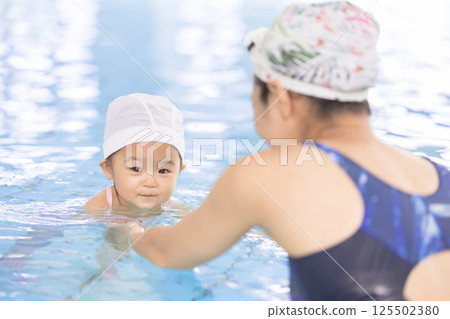 Baby Swimming Baby Swimming 125502380
