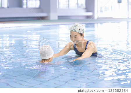 Baby Swimming Baby Swimming 125502384
