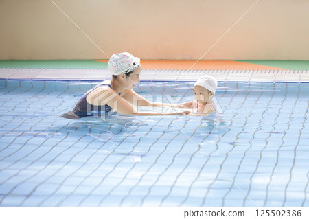 Baby Swimming Baby Swimming 125502386