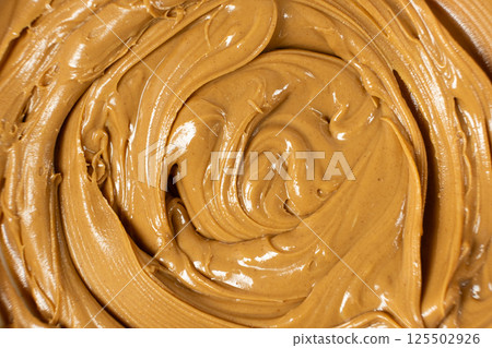 Creamy Texture American Natural Peanut Butter Top View Macro Creamy Texture American Natural Peanut Butter Top View Macro 125502926