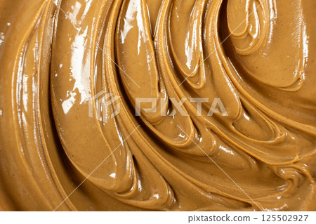 Creamy Texture American Natural Peanut Butter Top View Macro Creamy Texture American Natural Peanut Butter Top View Macro 125502927