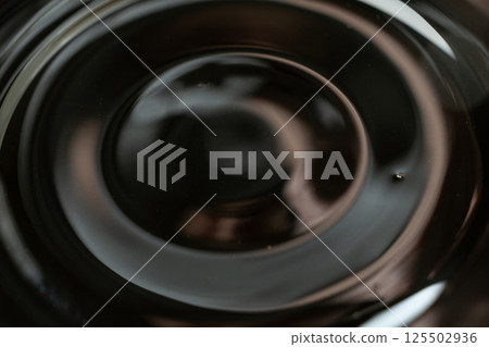 Abstract Black Brown Dark Background Macro View Soy Sauce. Abstract Black Brown Dark Background Macro View Soy Sauce. 125502936