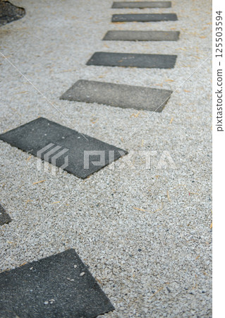 Stone path in the backyard garden, Japanese style 125503594