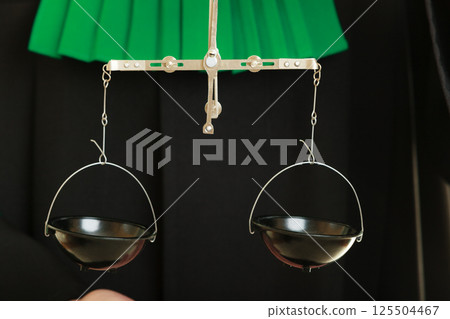 woman barrister holding scales. 125504467