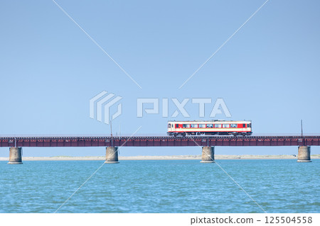 Train crossing the Yura River Bridge 125504558